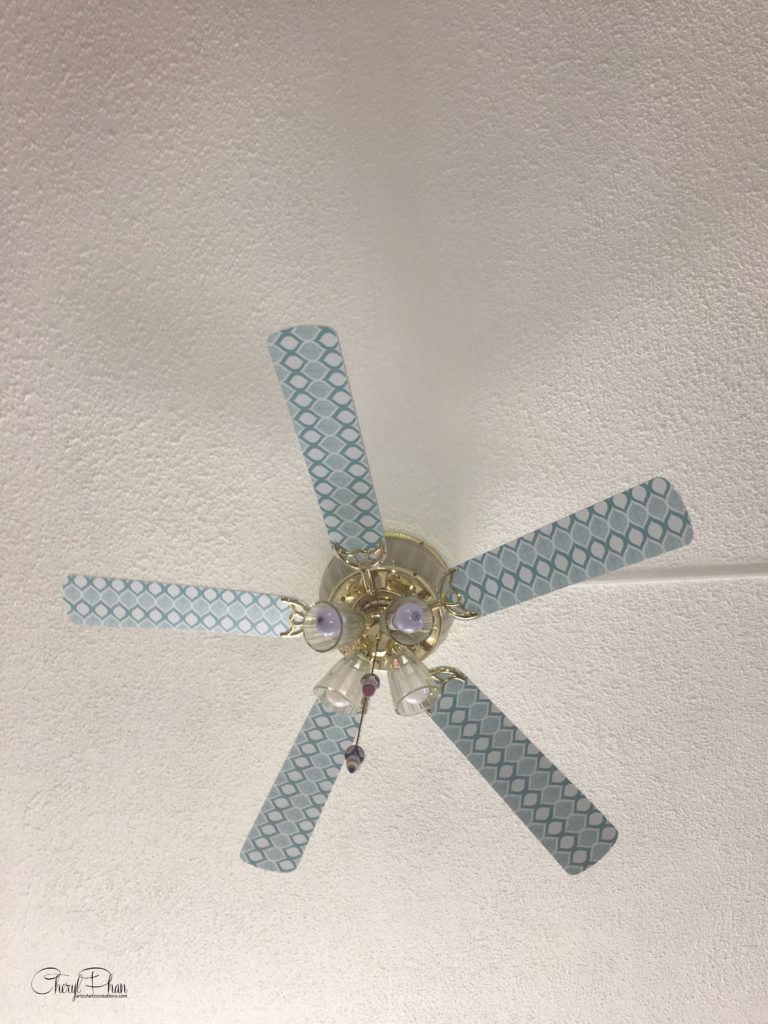 Update your ceiling fan with style using contact paper from the Dollar Tree for just $1.00 