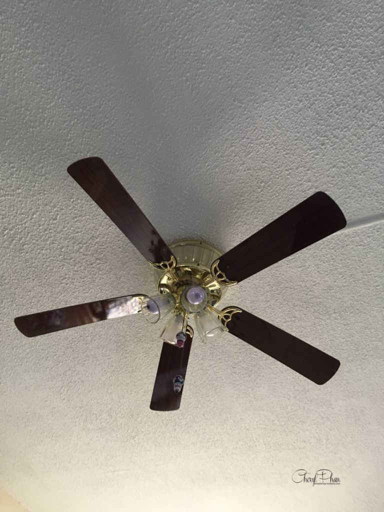 Update your ceiling fan with style using contact paper from the Dollar Tree for just $1.00 