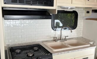 RV kitchen makeover using adhesive tile, backsplash transformation - a clean and easy DIY project.