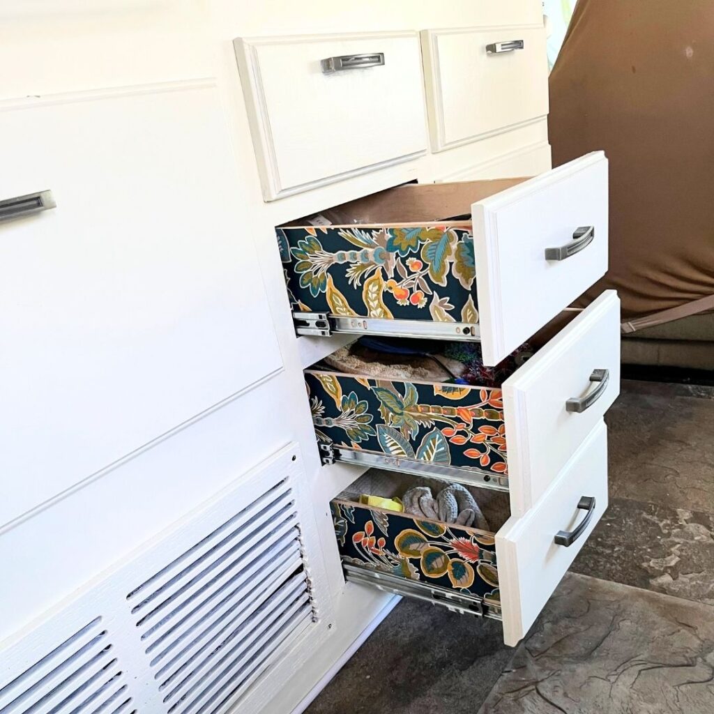 Drawer wallpaper transformation, a creative DIY home decor project.